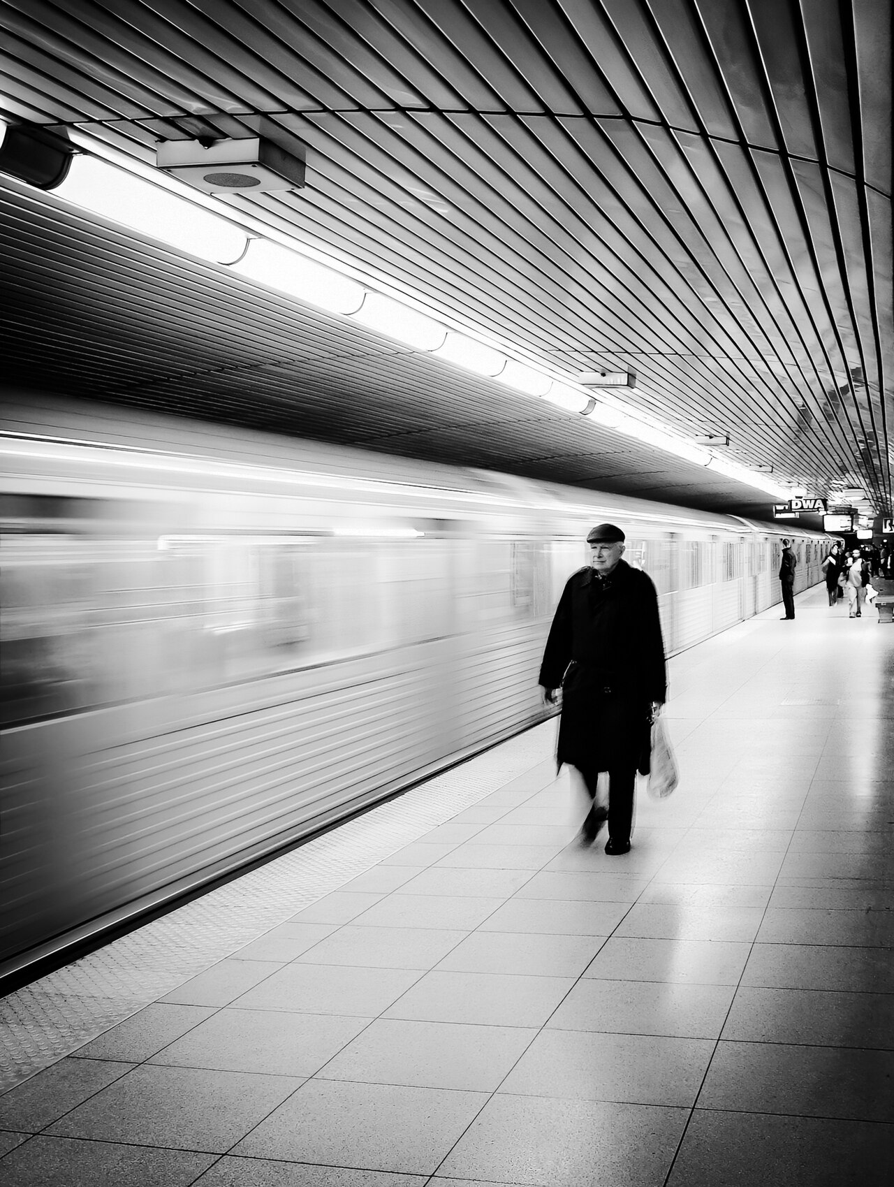A moving subject smeared by motion blur